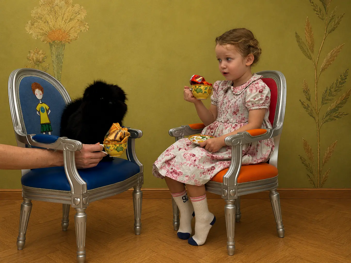 A girl at a tea party with a dog, silk scarves served in the bowls